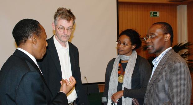 A group from Kenya talking with Alan Channer after the film 
