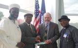 Dr David Smock, USIP receives Dr Golwa, Director General, Institute for Peace and Conflict Resolution of the Ministry of Foreign Affairs, Nigeria, and Imam Ashafa and Pastor Wuye